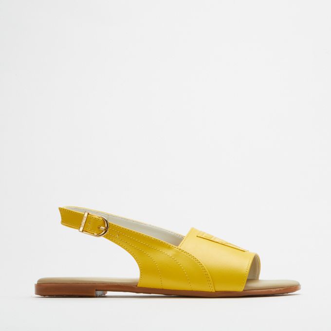 yellow puma slides