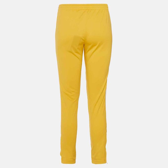 adidas sst track pants yellow